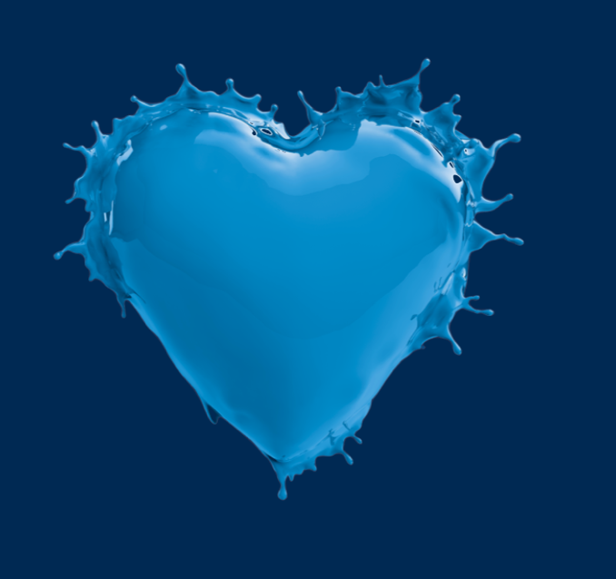 Porción de pintura en forma de corazón color azul claro con marcas de salpicadura.