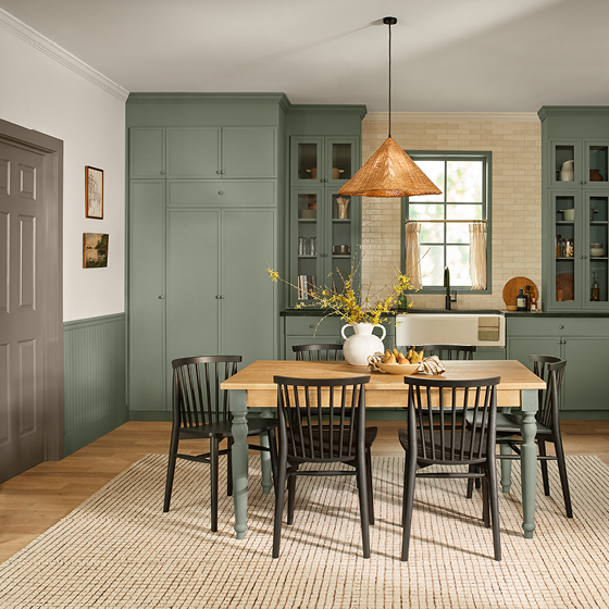Six-image carousel of living room, child’s room, entryway, backyard and kitchen, all incorporating Renew Blue.